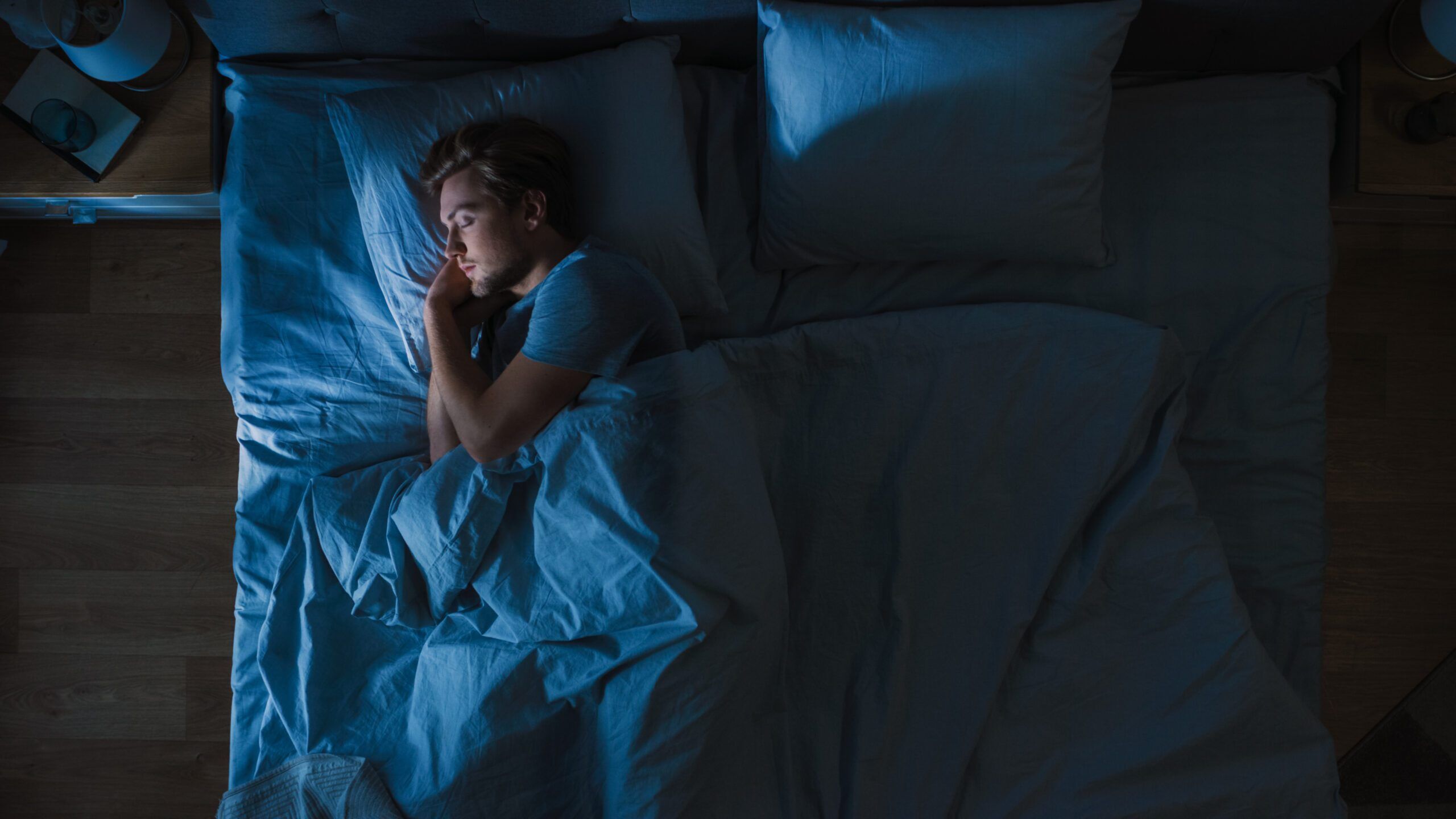 A man recovering by sleeping after a workout.