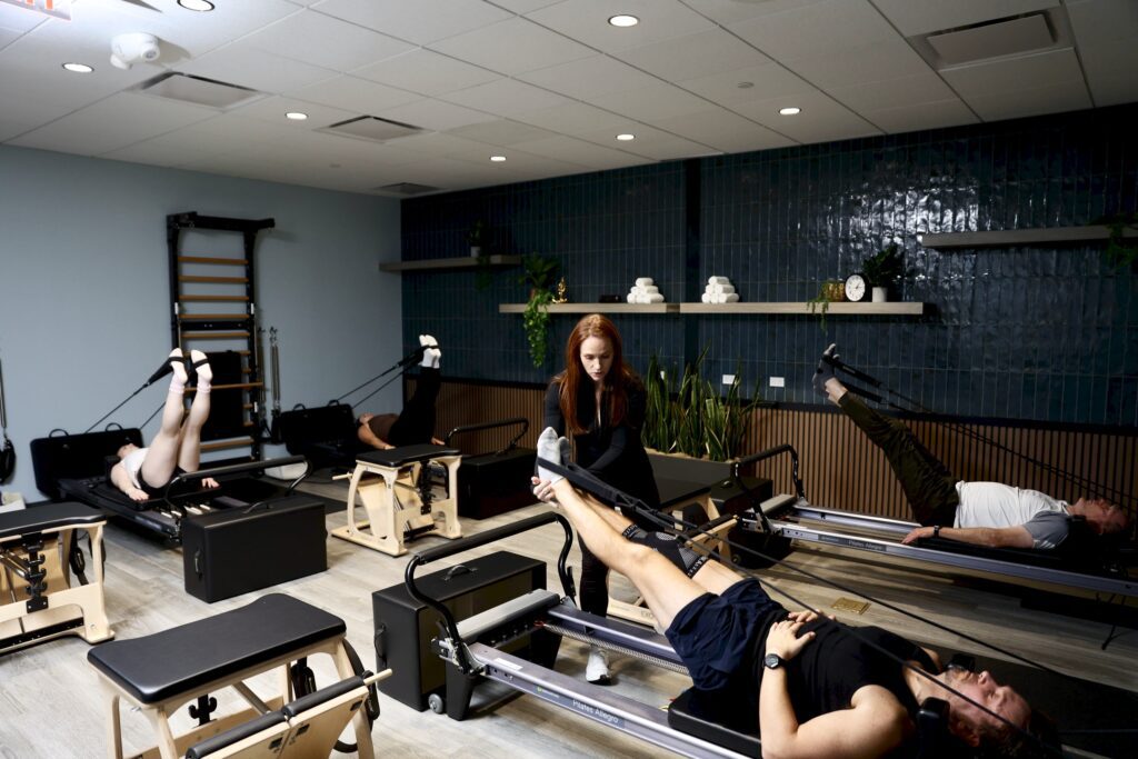 A Pilates Reformer class at Method Core & Pilates in Method Health Club in Ashburn, VA.